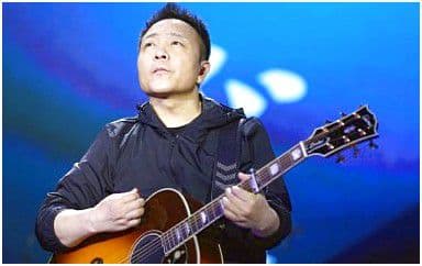 永远自由的心吉他谱_许巍_G调指法弹唱谱图片